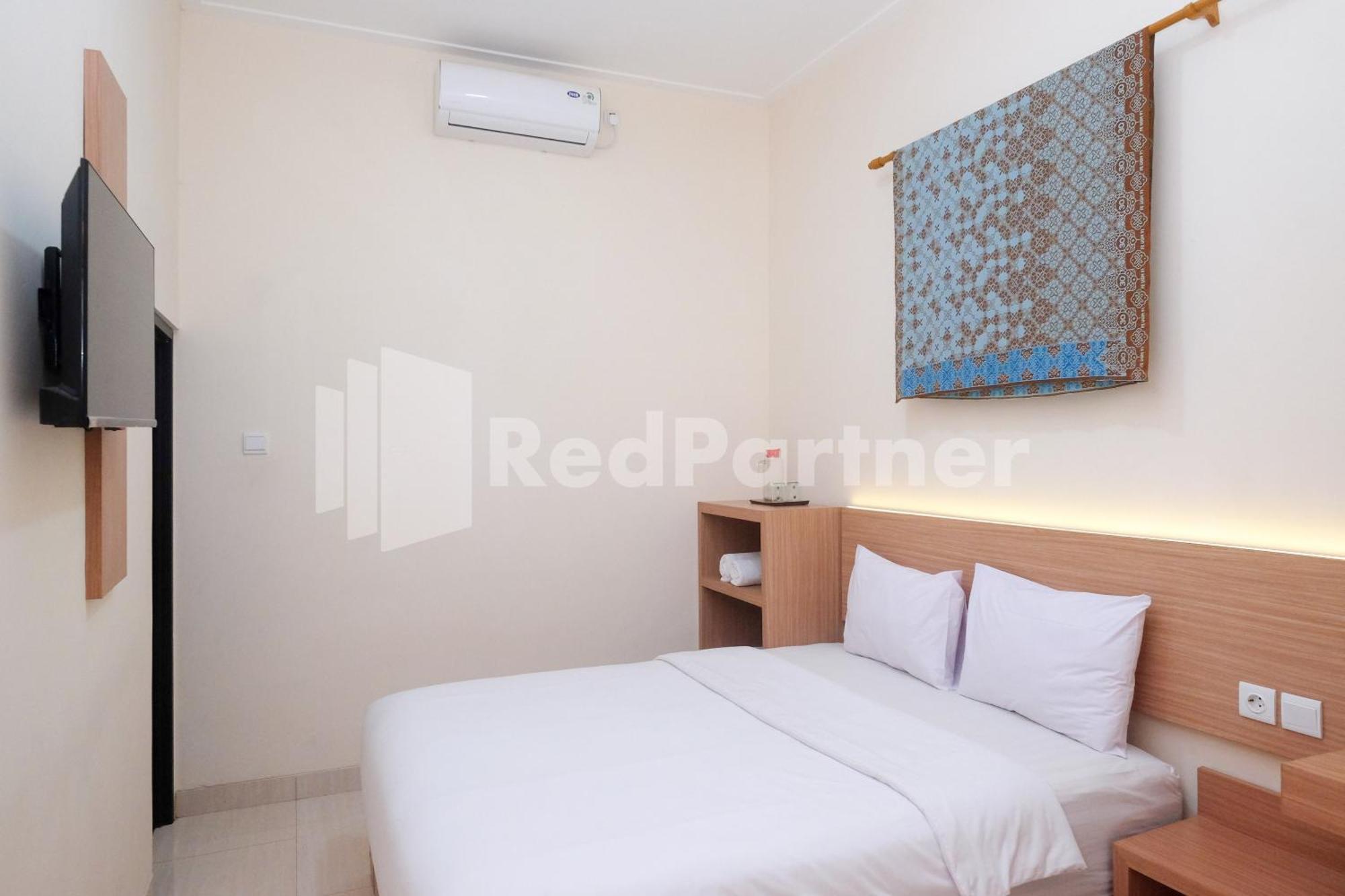 Ndliman House Near Ugm Jogja Mitra Reddoorz 호텔 Kejayan 외부 사진