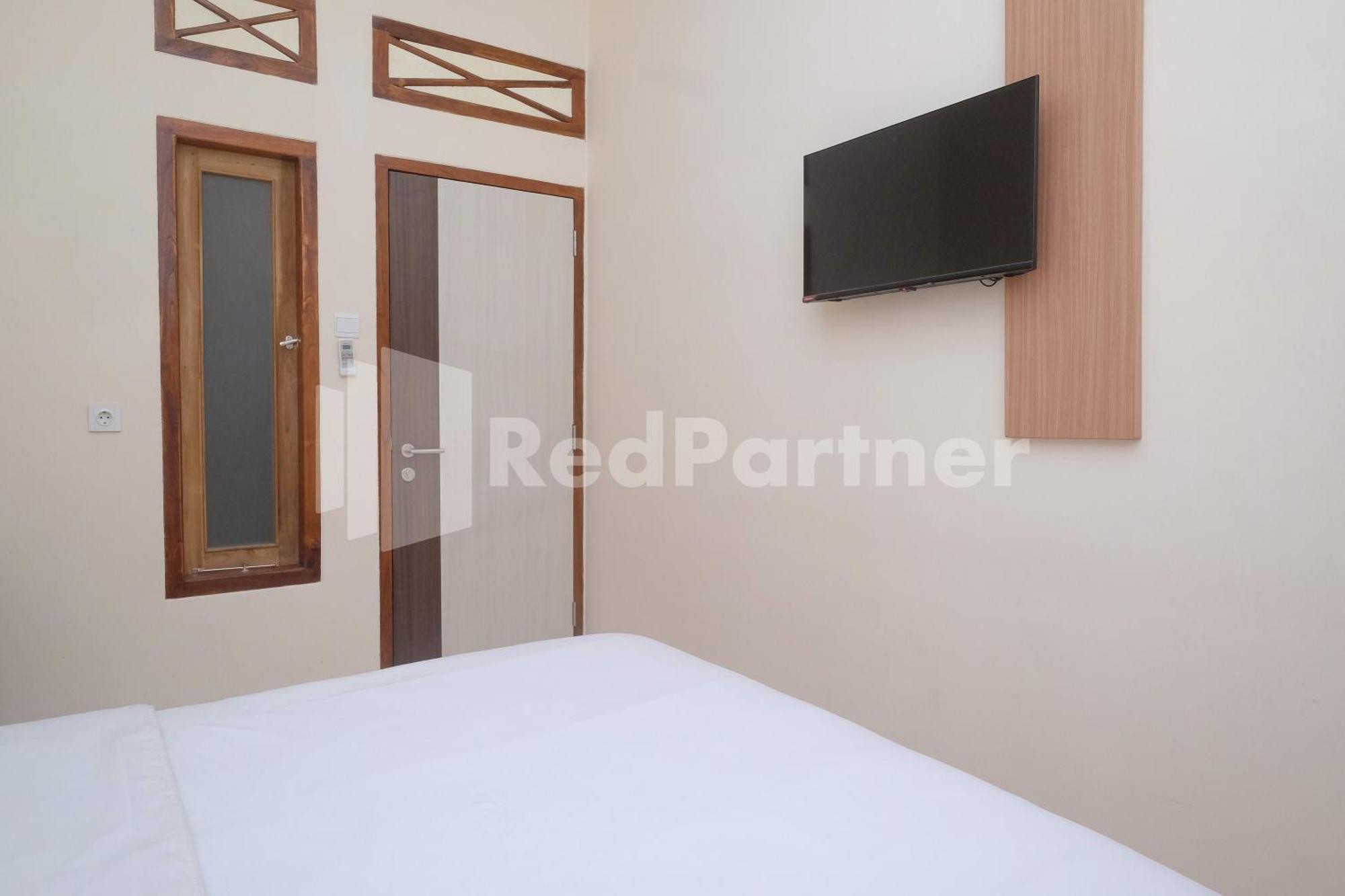 Ndliman House Near Ugm Jogja Mitra Reddoorz 호텔 Kejayan 외부 사진